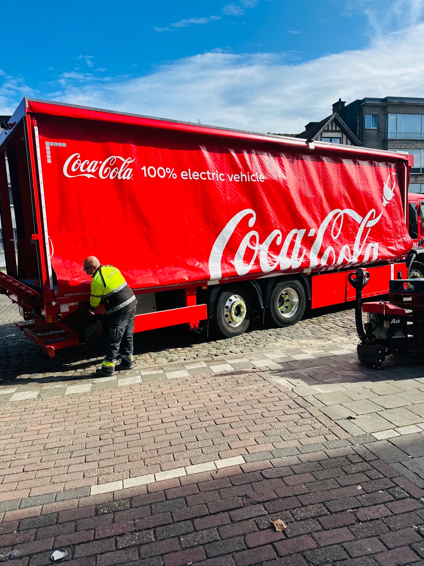 Electric Coca-Cola truck at Mix Drink BV during dispatch operations