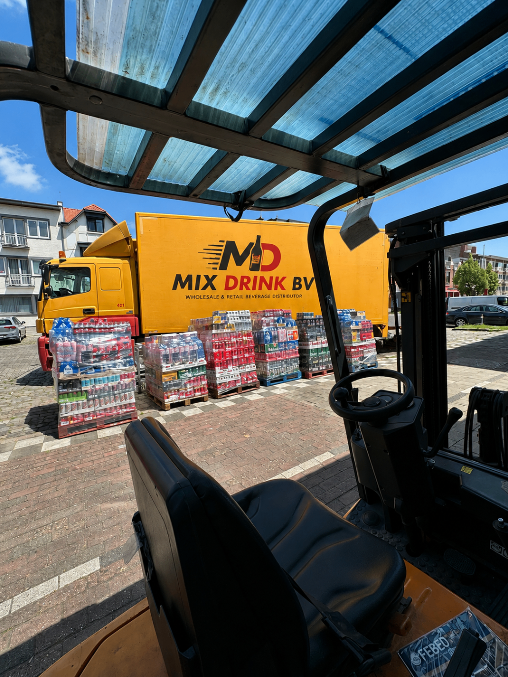 Mix Drink BV team working inside the warehouse with real pallet stock